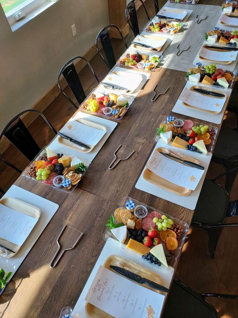 Table set with ingredients and tools for a charcuterie workshop at a local winery in State College, PA